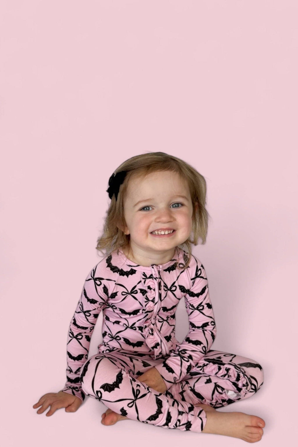 BATTY BOWS DREAM RUFFLE ROMPER
