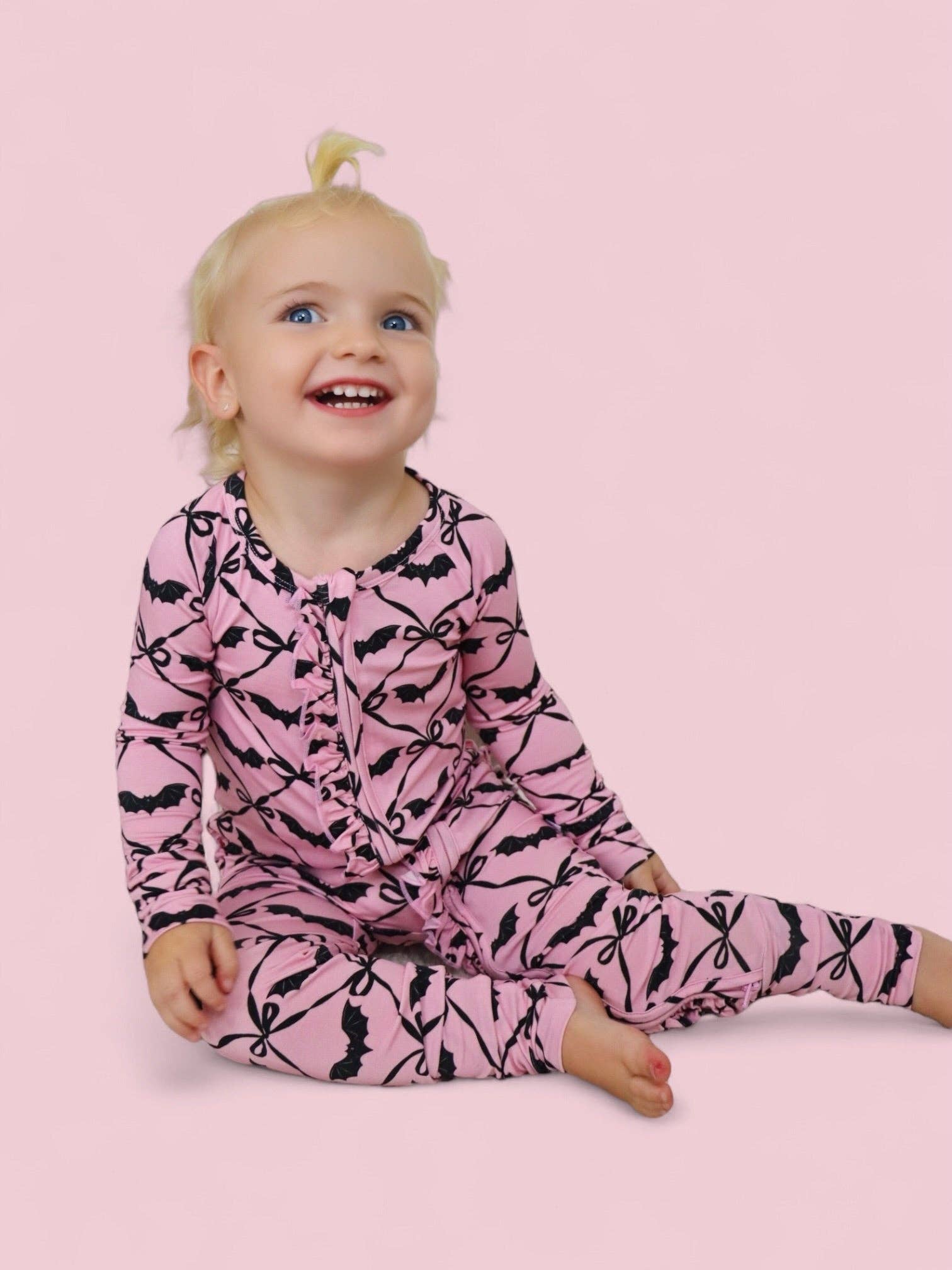 BATTY BOWS DREAM RUFFLE ROMPER