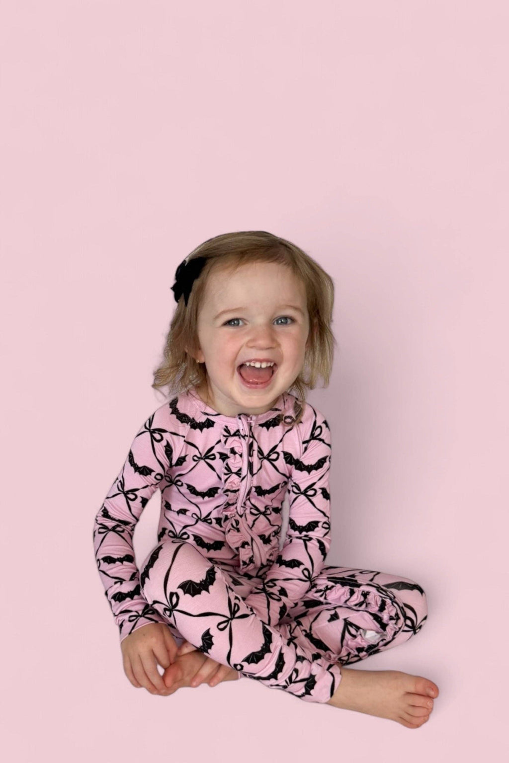 BATTY BOWS DREAM RUFFLE ROMPER