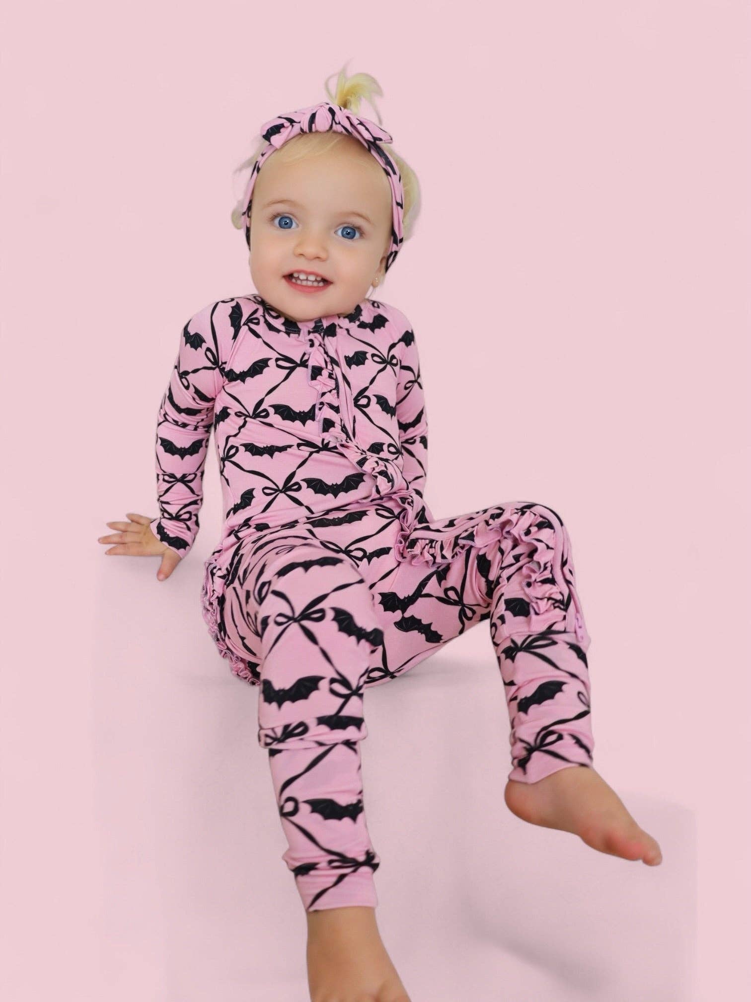 BATTY BOWS DREAM RUFFLE ROMPER